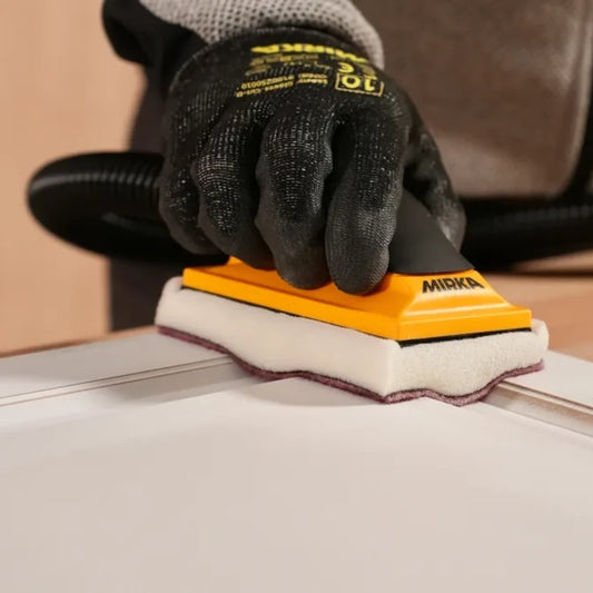 Mirka Profil-Schaumstoffsoftauflage in der Anwendung mit dem Mirka Handblock