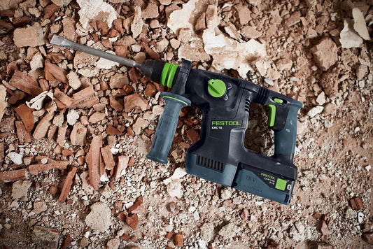 Festool KHC 18 Akku-Kombihammer mit grünem Zusatzhandgriff auf Bauschutt, Draufsicht