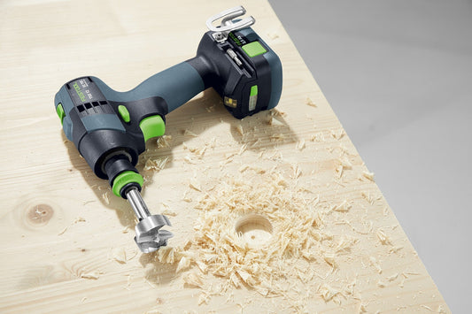 Festool TXS 12 Akku-Bohrschrauber mit CENTROTEC Werkzeug beim Bohren in Holz, FastFix-Schnittstelle