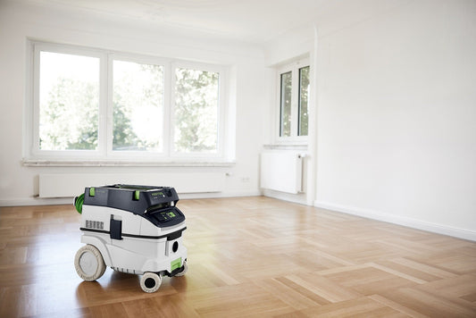 Festool CT 26 Sauger mit Radüberzieher RD-CT 26-48 auf Parkettboden in Wohnraum
